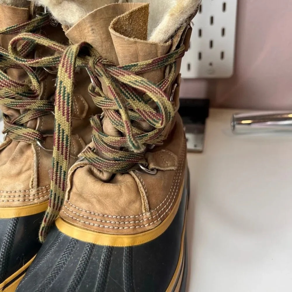 Sorel Caribou waterproof winter boots in tan leather featuring a distinctive cre